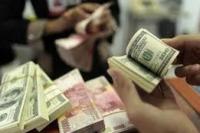 Pasar Tunggu Terhadap Keputusan The Fed,  Rupiah Menguat