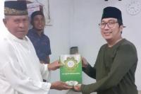 Sambangi Sumbar, AMK Serahkan Mushaf Qur`an