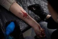 Tato Patriotik Kian Populer di Ukraina 