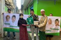 Momentum Ramadan, AMK Bagikan Sembako Bagi Kaum Janda