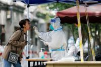 Bagai Penjara, Shanghai dan Beijing Tingkatkan Pembatasan Covid