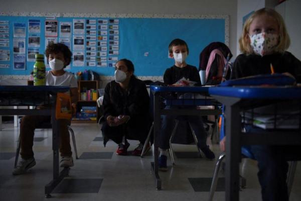 CDC Amerika Tidak Lagi Wajibkan Karantina Siswa yang Terpapar COVID-19