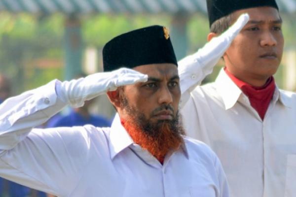 Ilustrasi - orang sedang hormat ke bendera Merah Putih (Foto: ANTARA) 