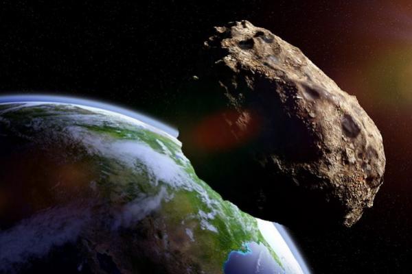 Ilustrasi asteroid mendekati bumi. (FOTO: SHUTTERSTOCK) 