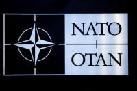Logo NATO terlihat pada pertemuan Dewan Atlantik Utara di markas besar Aliansi di Brussels, Belgia 15 Februari 2024. REUTERS