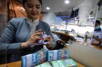Pasar Saham Bergejolak, OJK Sebut Menyimpan Uang di Bank Jadi Solusi