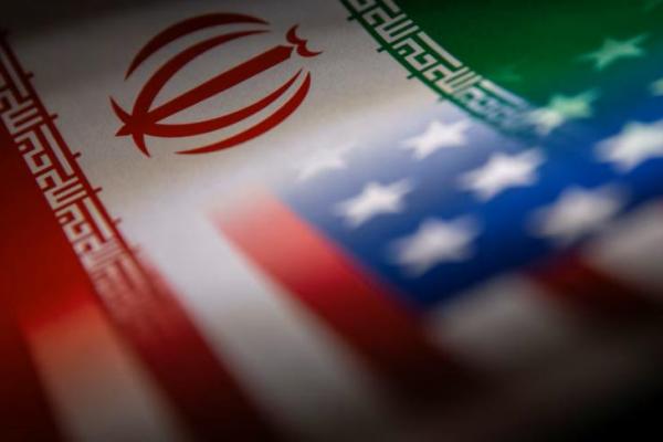 Bendera Iran dan AS terlihat dicetak di atas kertas dalam ilustrasi ini yang diambil pada 27 Januari 2022. REUTERS 
