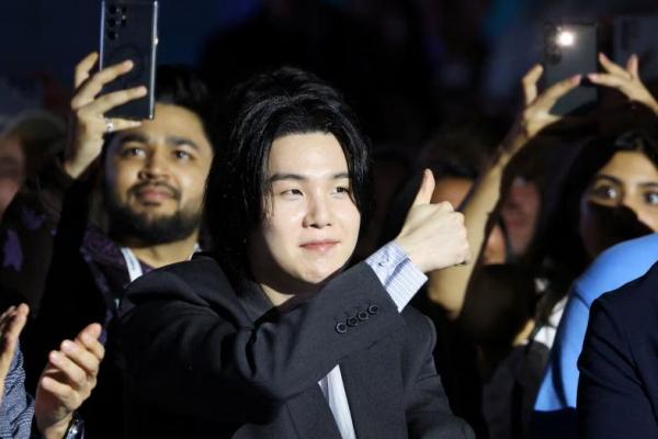 Anggota boy band K-pop BTS Suga menghadiri Samsung Galaxy Unpacked 2023 di Seoul, Korea Selatan, 26 Juli 2023. REUTERS 