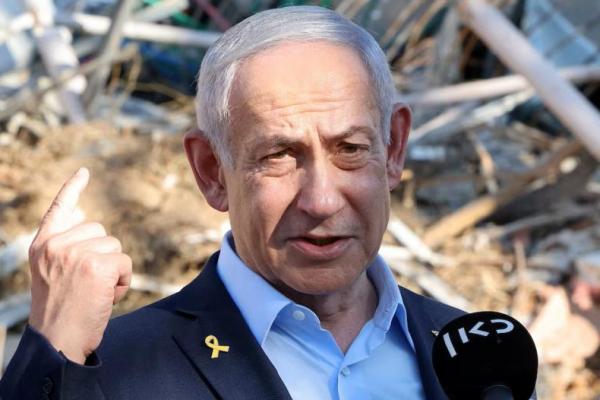 Perdana Menteri Israel Benjamin Netanyahu memberikan pernyataan saat berkunjung ke lokasi Institut Sains Weizmann, di pusat kota Rehovot, Israel 20 Juni 2025. JACK GUEZ via REUTERS 