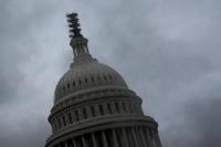 Uap yang mengepul menutupi sebagian gedung Capitol AS di Washington, AS, 24 September 2023. REUTERS