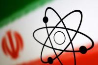 Simbol atom dan bendera Iran terlihat dalam ilustrasi ini, 21 Juli 2022. REUTERS