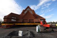 Terkena Relokasi Perluasan Tambang, Gereja Kayu Swedia Diangkut dengan Trailer