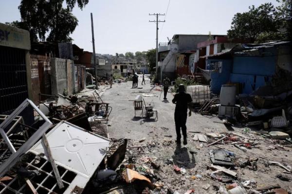 Warga kembali ke lingkungan Delmas 30 setelah pemimpin geng Jimmy Cherizier menarik pasukannya dan mendesak mantan penduduk untuk kembali ke rumah mereka, di Port-au-Prince, Haiti, 27 Agustus 2025. REUTERS 