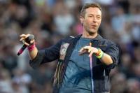 Vokalis Coldplay Chris Martin menggelar konser di Stadion Wembley, London, Minggu (31/8/2025). (FOTO: GETTY IMAGE)