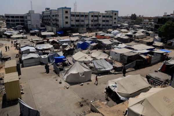Warga Palestina mengungsi di Khan Younis, di Jalur Gaza selatan, 19 Agustus 2025. REUTERS 