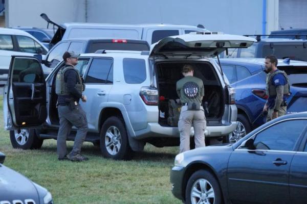 Agen FBI bersiap di Fasilitas Operasi Kepolisian Taman AS Anacostia di Washington, AS, 13 Agustus 2025. REUTERS 