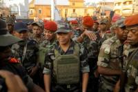 Pangkalan militer Malagasi menyambut Kolonel Michael Randrianirina setelah ia menyatakan mengambil alih kekuasaan di Antananarivo, Madagaskar, 14 Oktober 2025. REUTERS