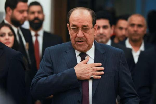 Mantan Perdana Menteri Irak Nouri al-Maliki saat pemilihan dewan provinsi Irak, di sebuah tempat pemungutan suara di Baghdad, Irak, 18 Desember 2023. REUTERS 