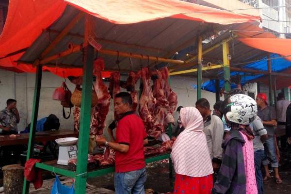 Ilustrasi pedagang daging dalam rangka menyambut tradisi Meugang di Aceh (Foto: Si Gam via Wikipedia) 