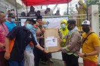 DPP BKPRMI Salurkan Bantuan Polri Berupa Masker dan Sembako Pada Korban Banjir Banjarmasin