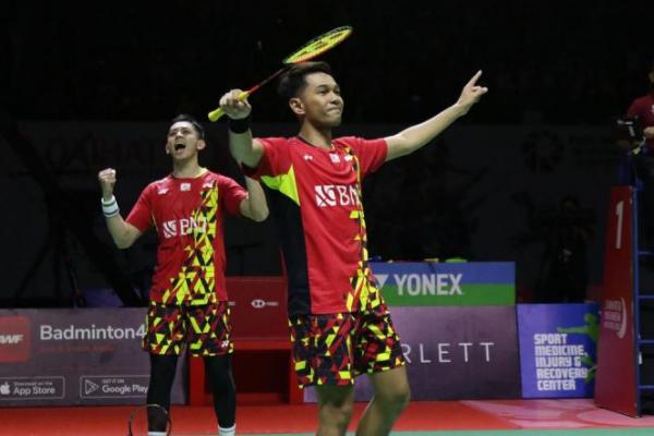 Ekspresi kegembiraan Fajar Alfian/Muhammad Rian Ardianto merayakan kemenangan atas Liang Wei Keng/Wang Chang (China) pada Final Indonesia Masters 2022 di Istora Senayan, Jakarta, Minggu (12/6/2022).(foto: Liputan6.com)