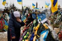 Setahun Invasi, Ukraina Berduka Atas Kematian Warga dan Janjikan Kemenangan